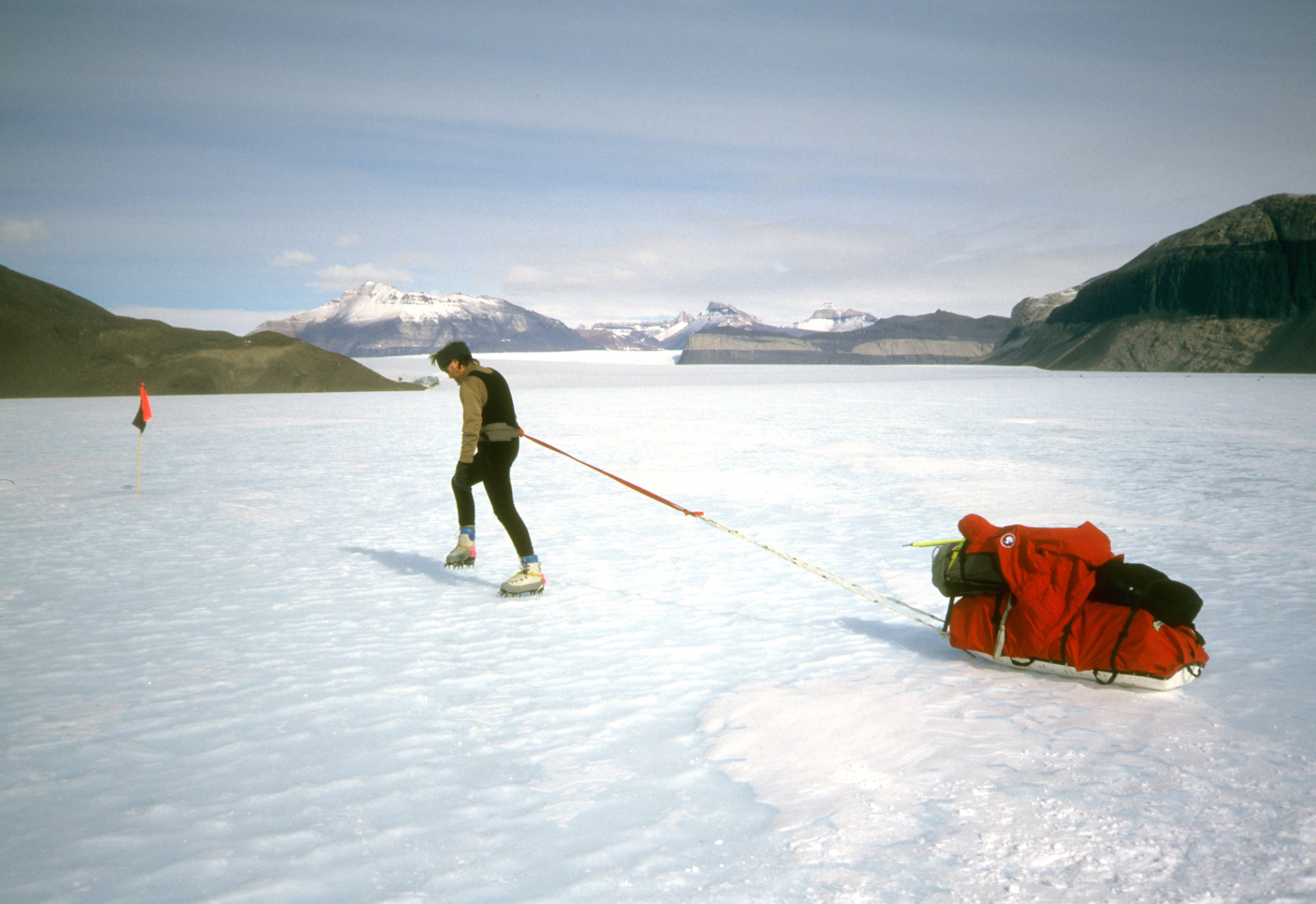 Bert Davis hauling research gear on the glacier